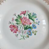 Flat antique earthenware plates with gilded edges