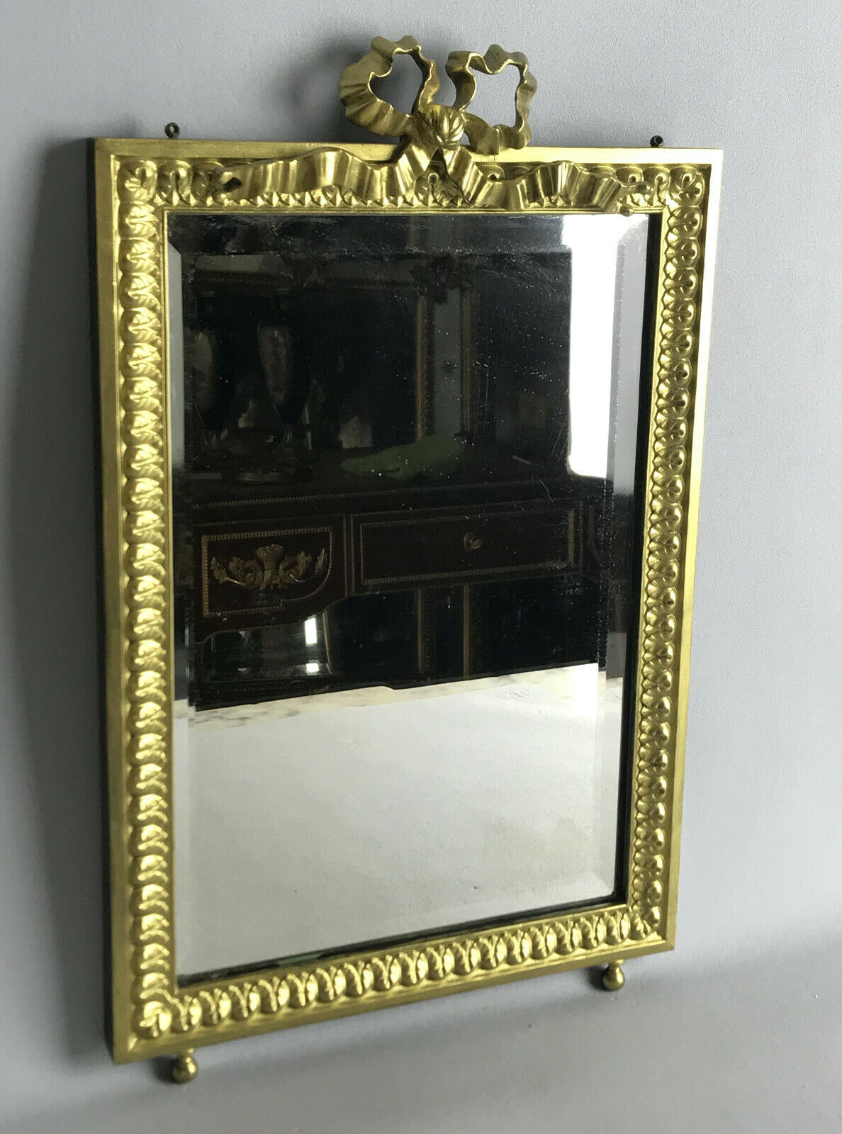 Old gilded bronze mirror in Louis XVI style with beveled mirror 37x23,5cm