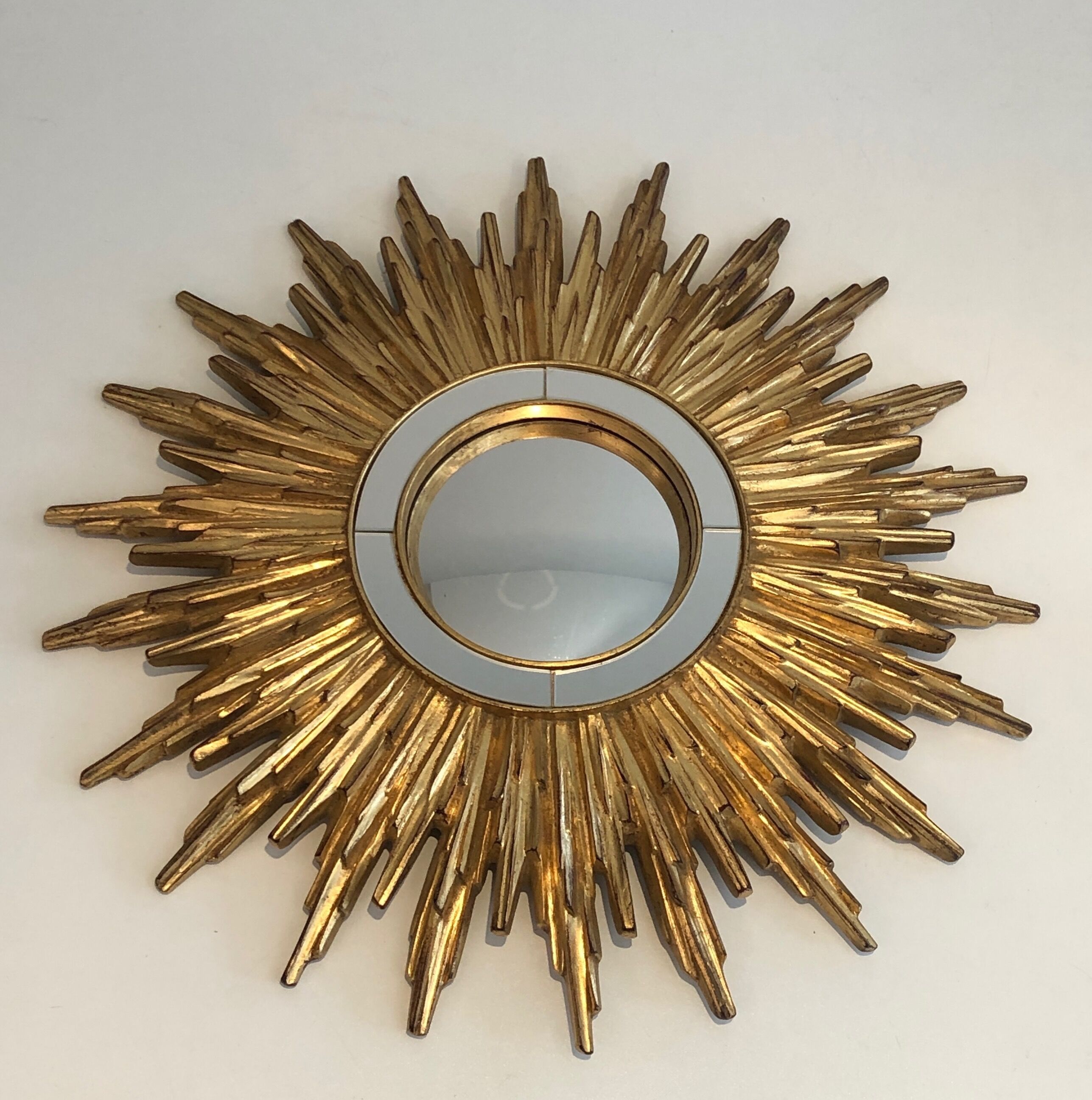 Sun mirror in golden resin 50cm