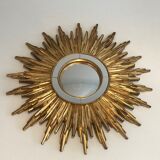 Sun mirror in golden resin 50cm