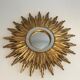 Sun mirror in golden resin 50cm