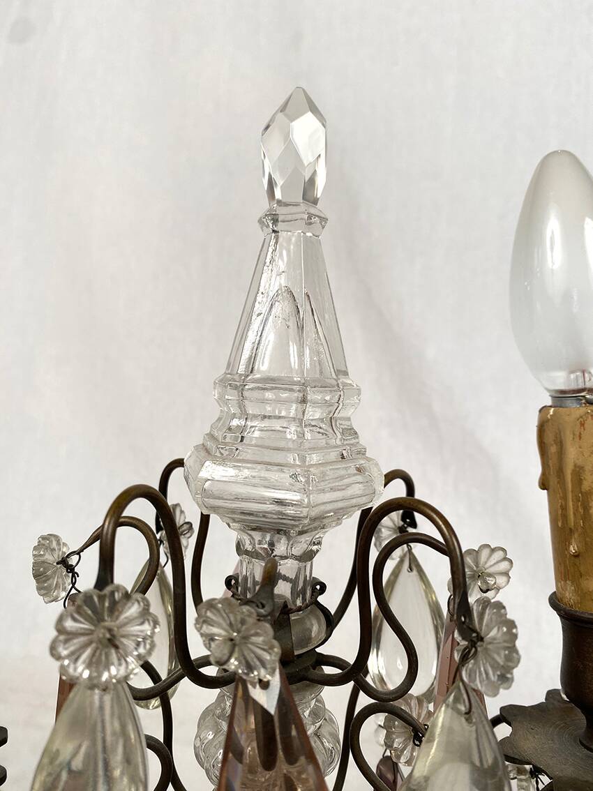 Pair of bronze chandeliers with tassels
