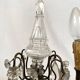 Pair of bronze chandeliers with tassels