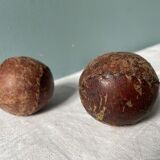 Two old nineteenth century leather golf balls