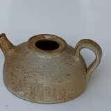 Vintage teapot in reeds