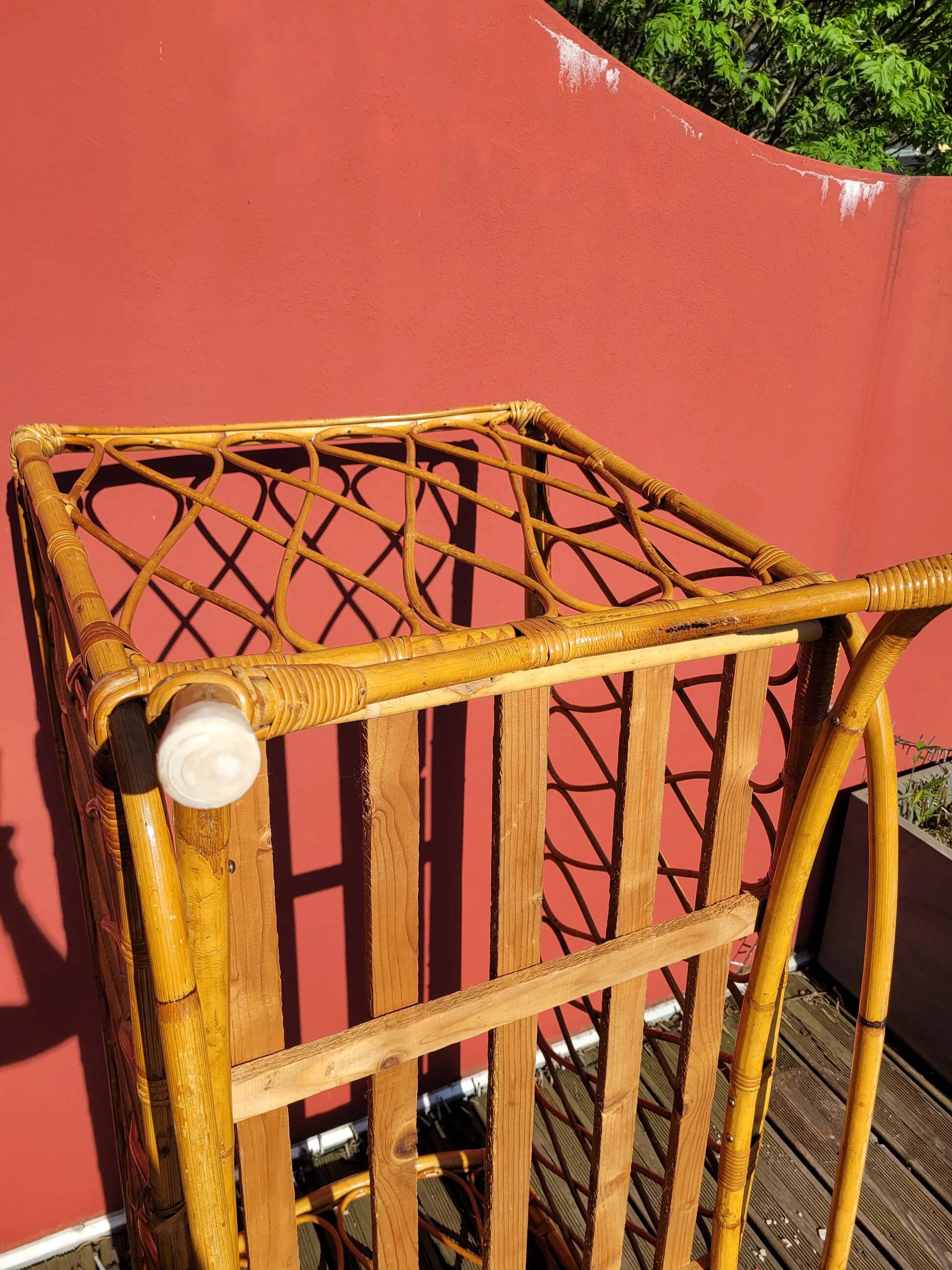 Bamboo and rattan baby cot with canopy.