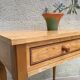Formica and vintage wood bedside table
