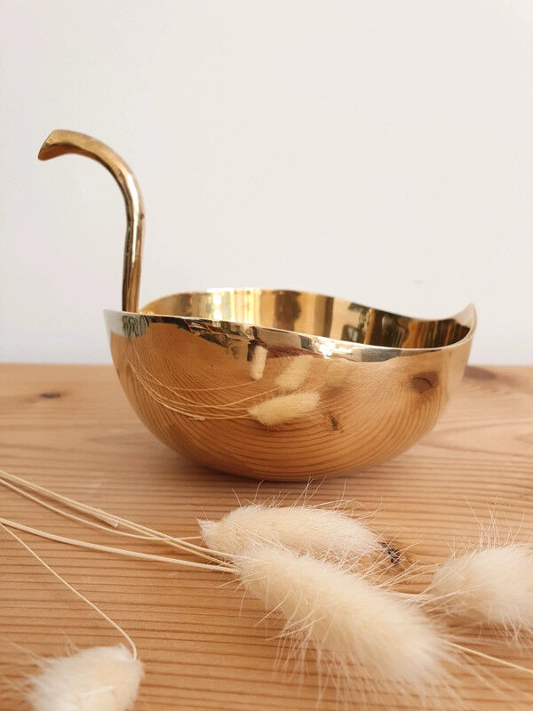 Empty brass apple pocket