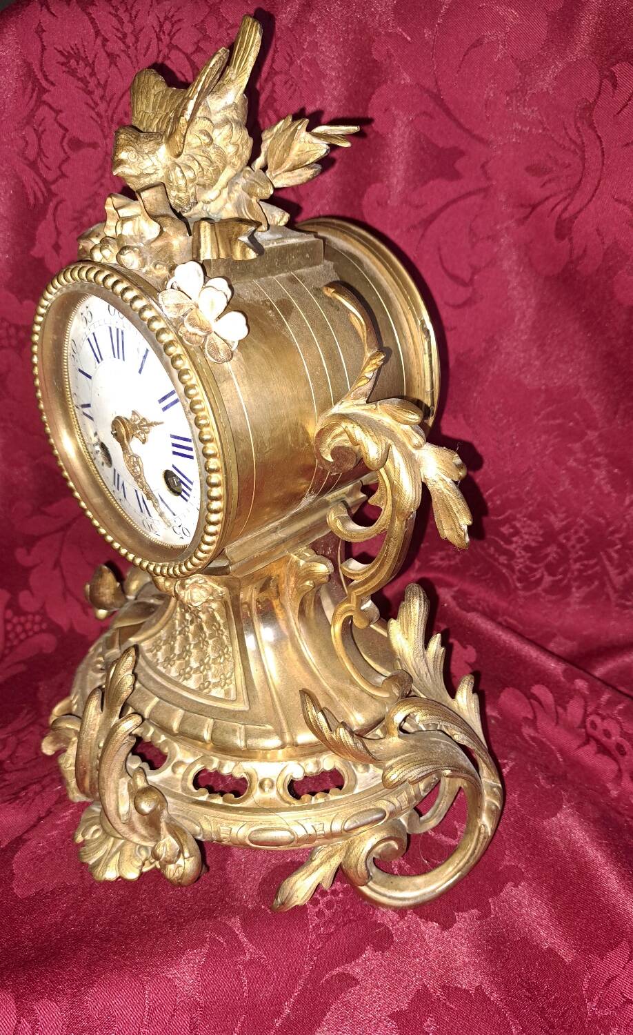 Clock, cartel in gilded bronze. Louis XV