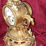 Clock, cartel in gilded bronze. Louis XV