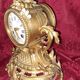 Clock, cartel in gilded bronze. Louis XV