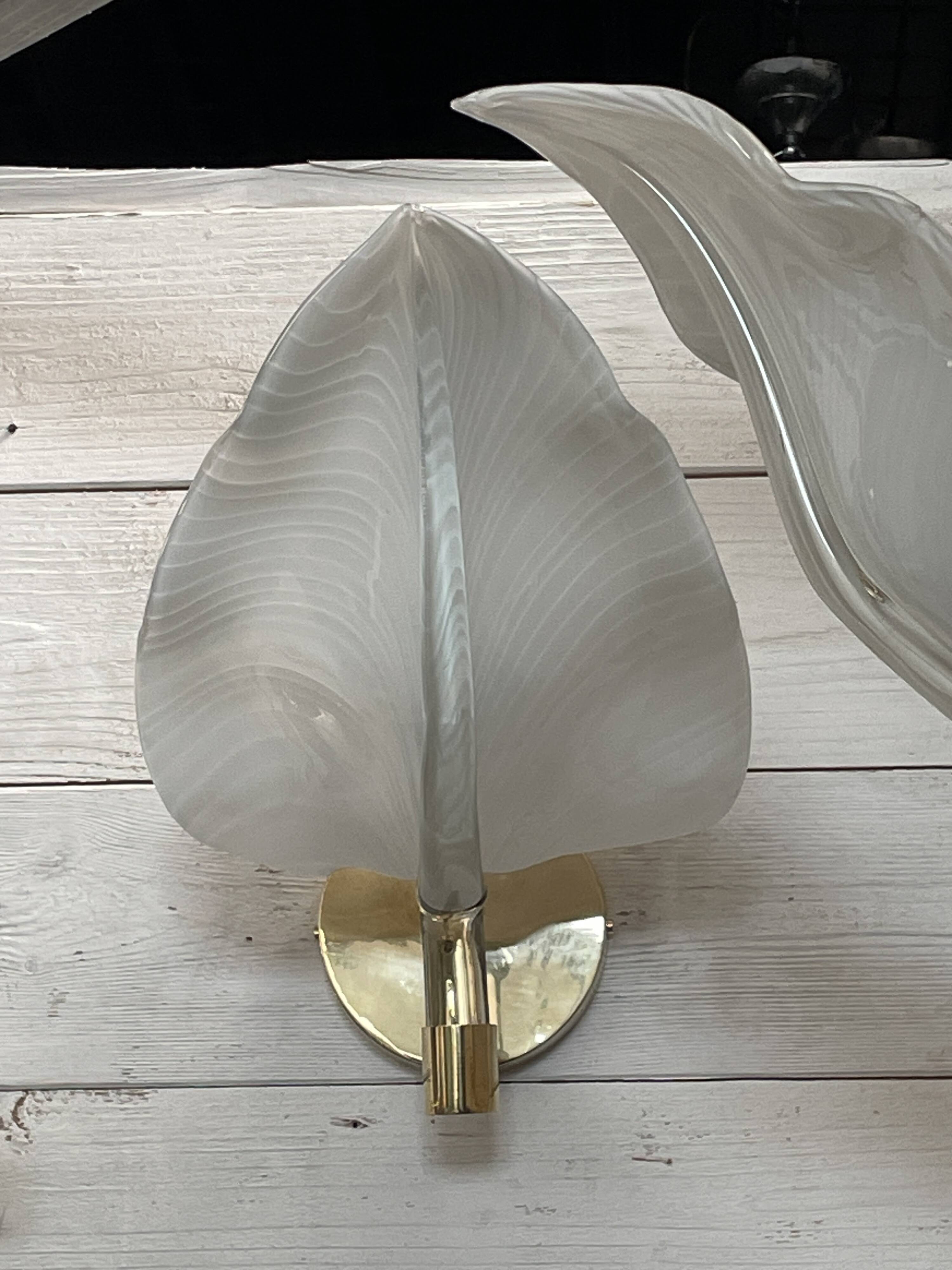 Set of 3 Murano glass wall lamps in white and brass, 1970s.