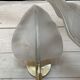 Set of 3 Murano glass wall lamps in white and brass, 1970s.