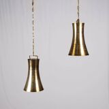 Pair of brass pendants, hourglass shape, 1960s