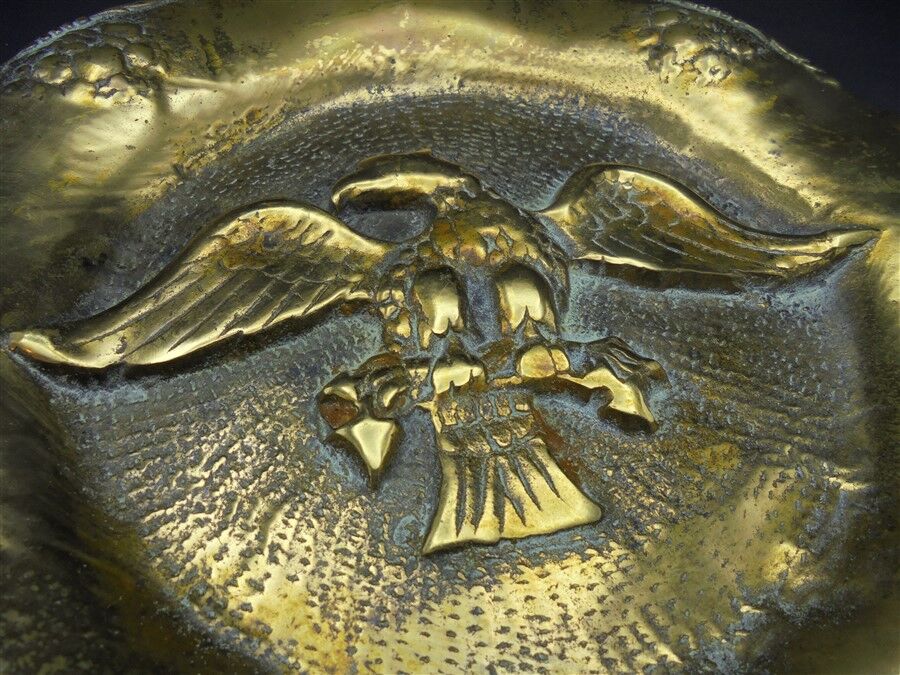 Bronze plate decorated with an eagle