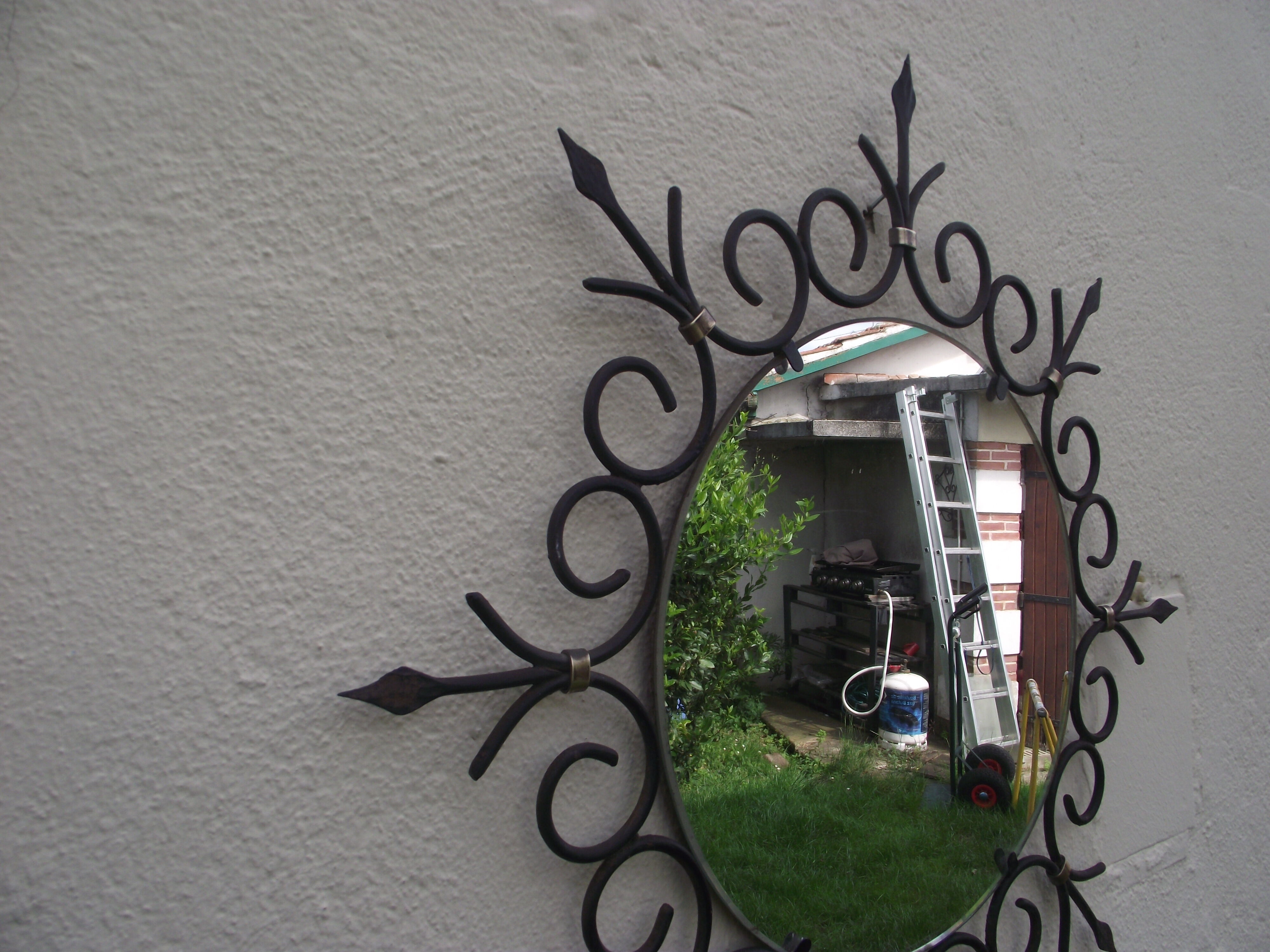 Mirror sun of the 50s in wrought iron and brass 55cm