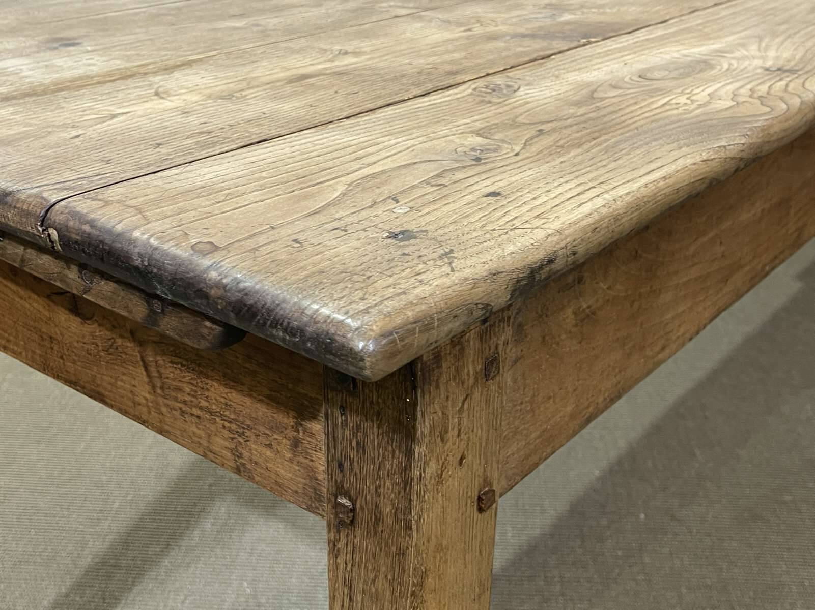 19th century farmhouse table in raw chestnut with original drawer and shelf