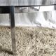 Table basse de forme élyptique en metal chomé et verre fumé, années 70