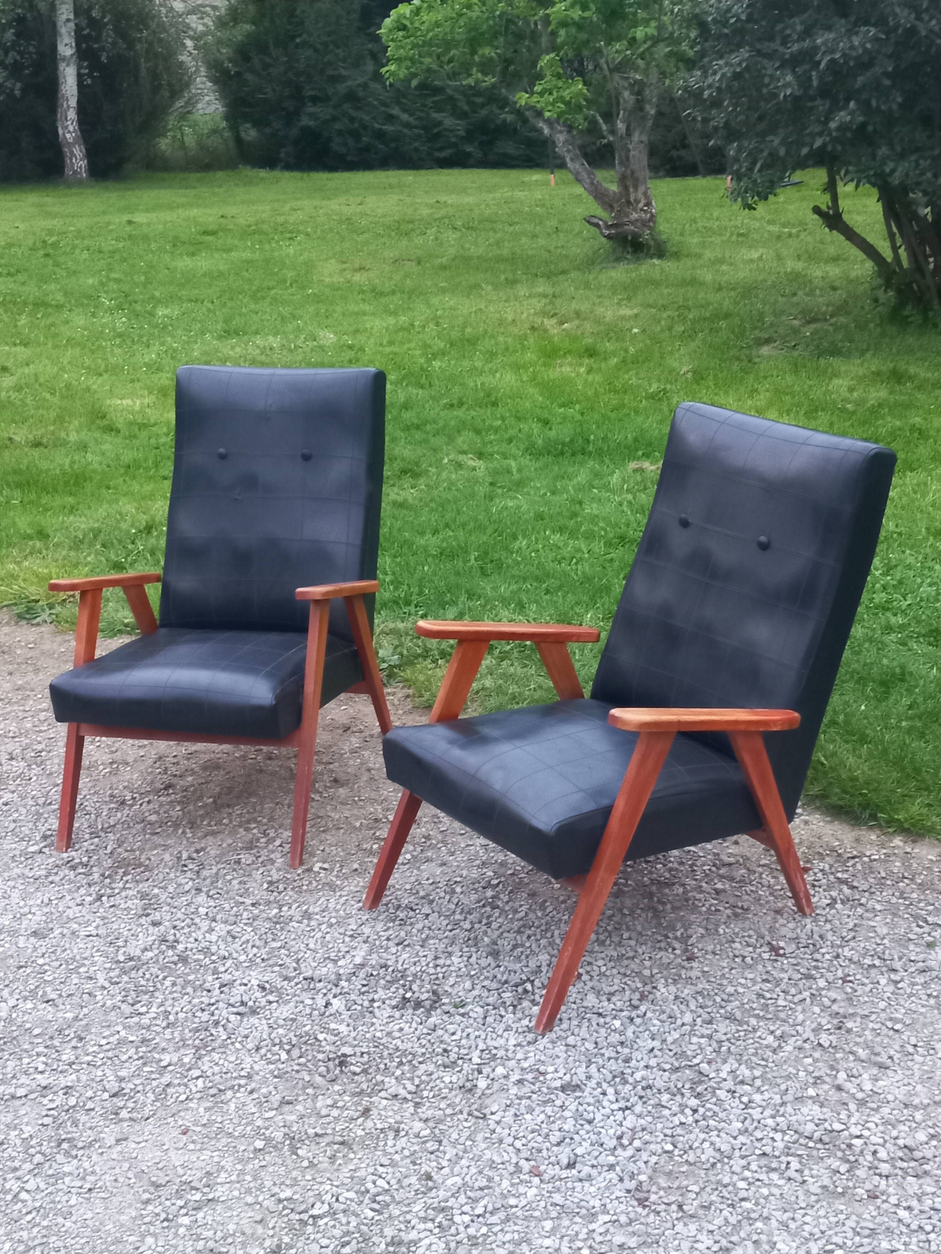 Pair of vintage beech armchairs feet compass covered with black moleskine from the 50s