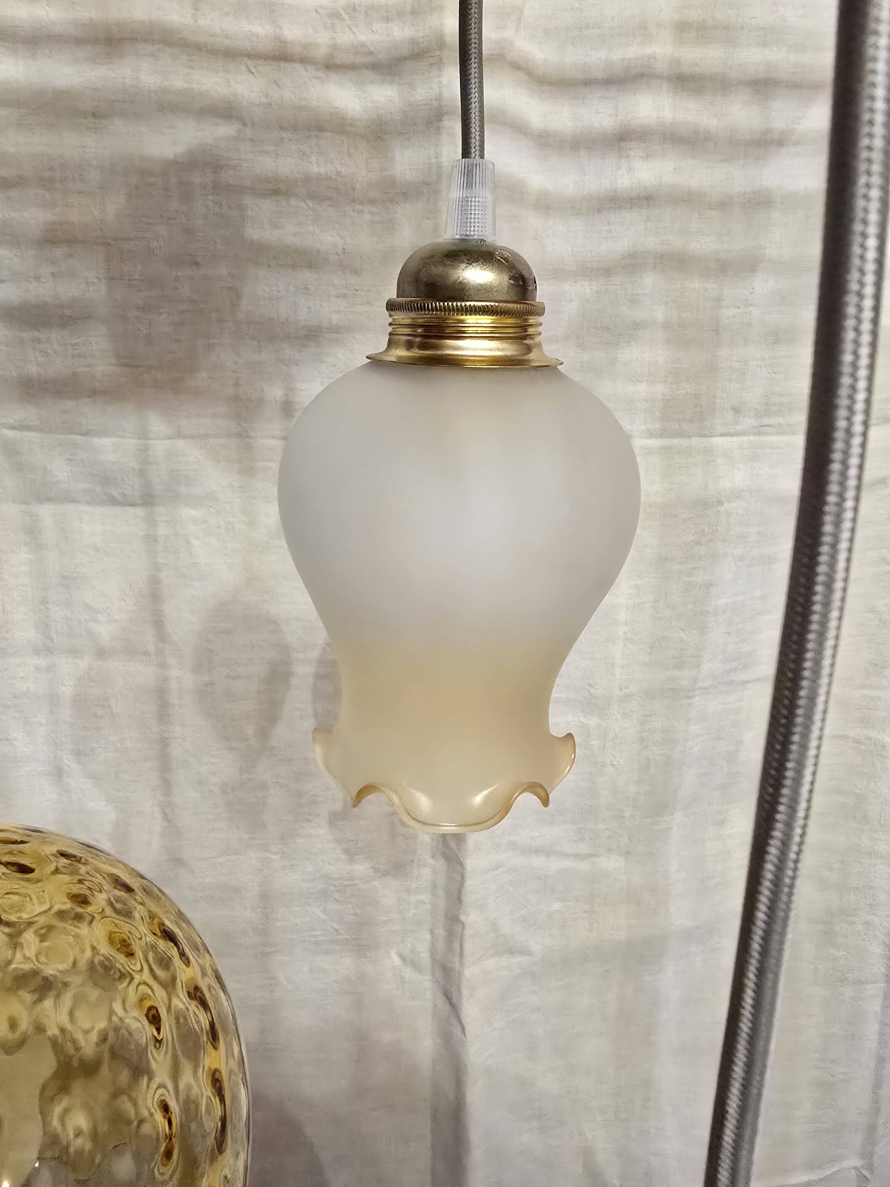 Suspension triple opaline with engraved and frosted glass in shades of yellow-orange.