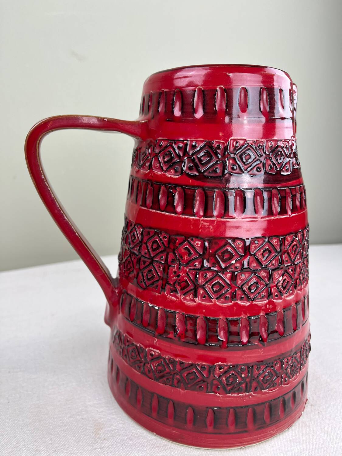 Vintage red ceramic jug