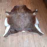 Tapis en peau de vache, vintage des années 1980. Travail artisanal, fait ma