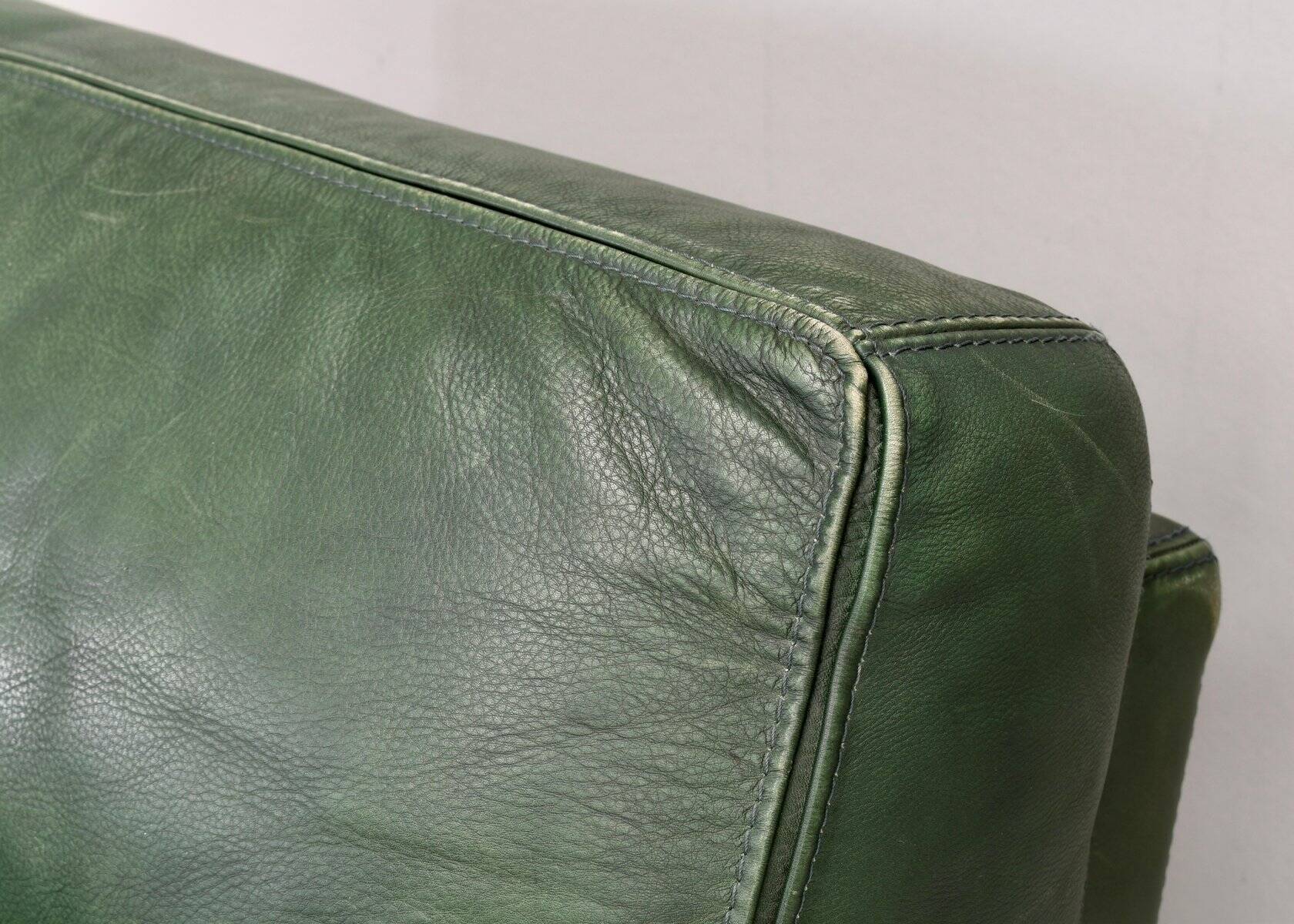 Roche Bobois lounge armchair in original green patinated leather, 1970
