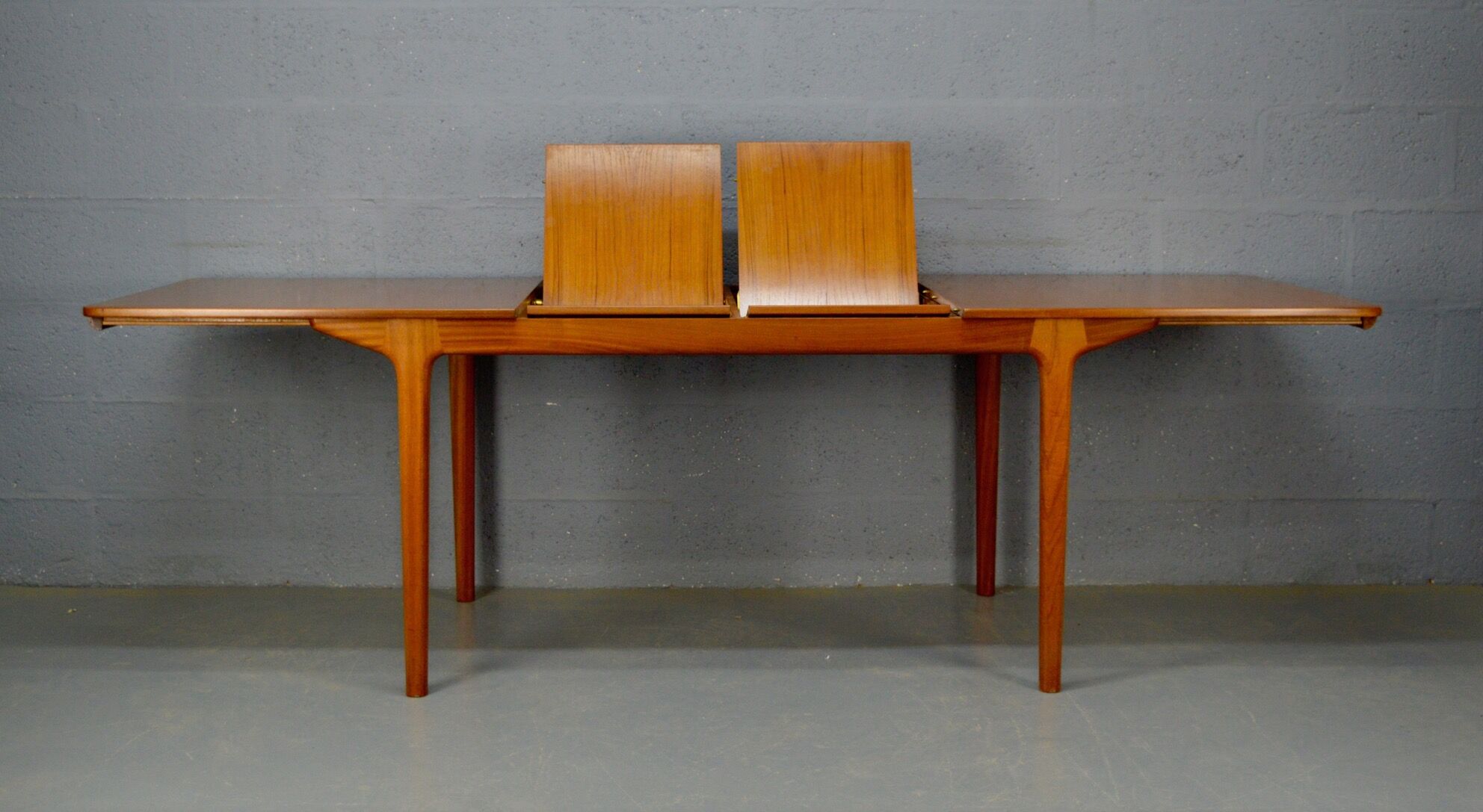 Extendable table by A.H. McIntosh