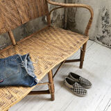 Old wicker and rattan bench