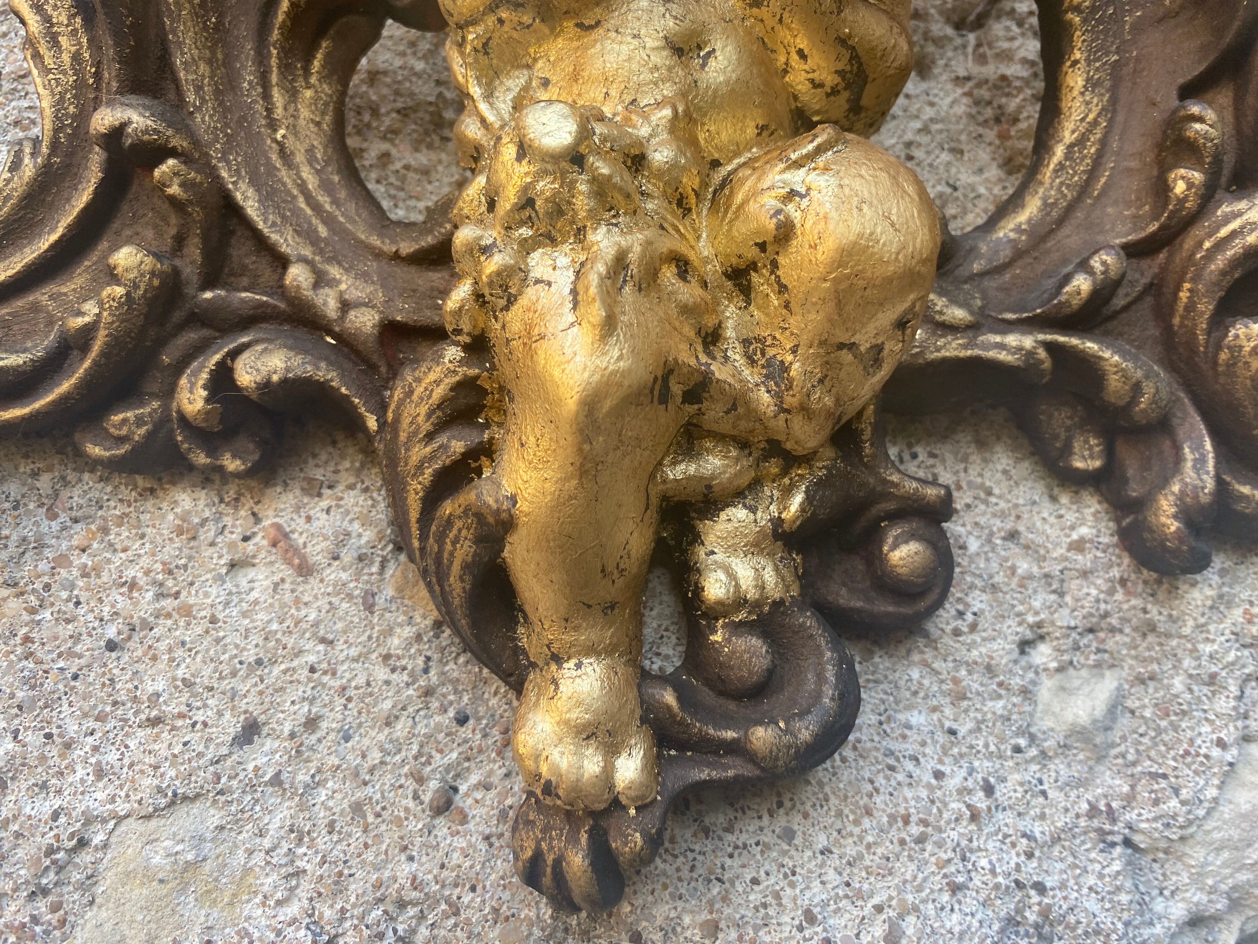 Pediment cherub musician