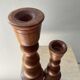Duo of vintage candlesticks in turned wood