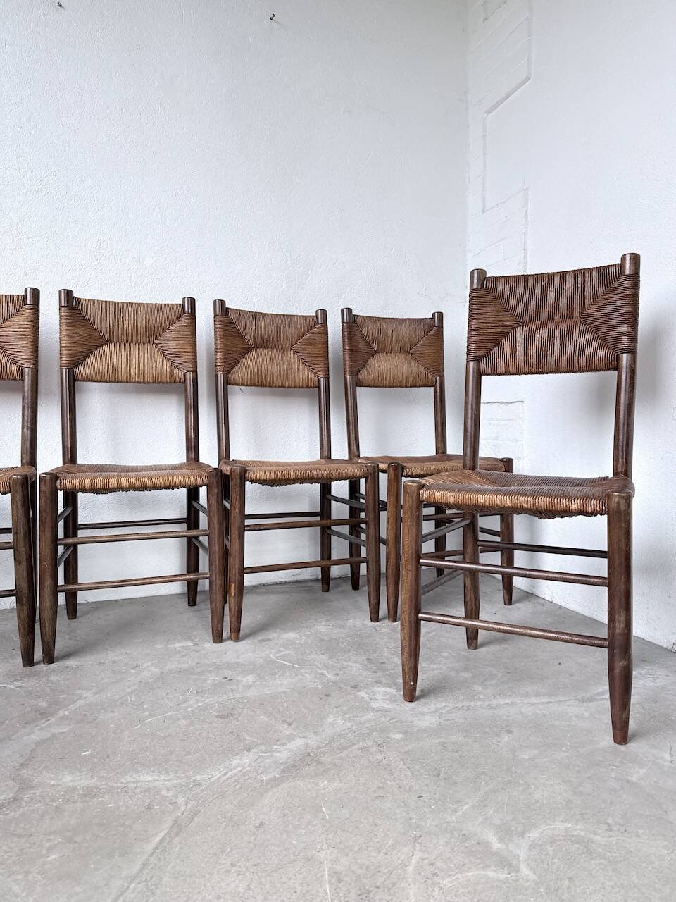 Set of 6 straw and oak Beauche chairs.