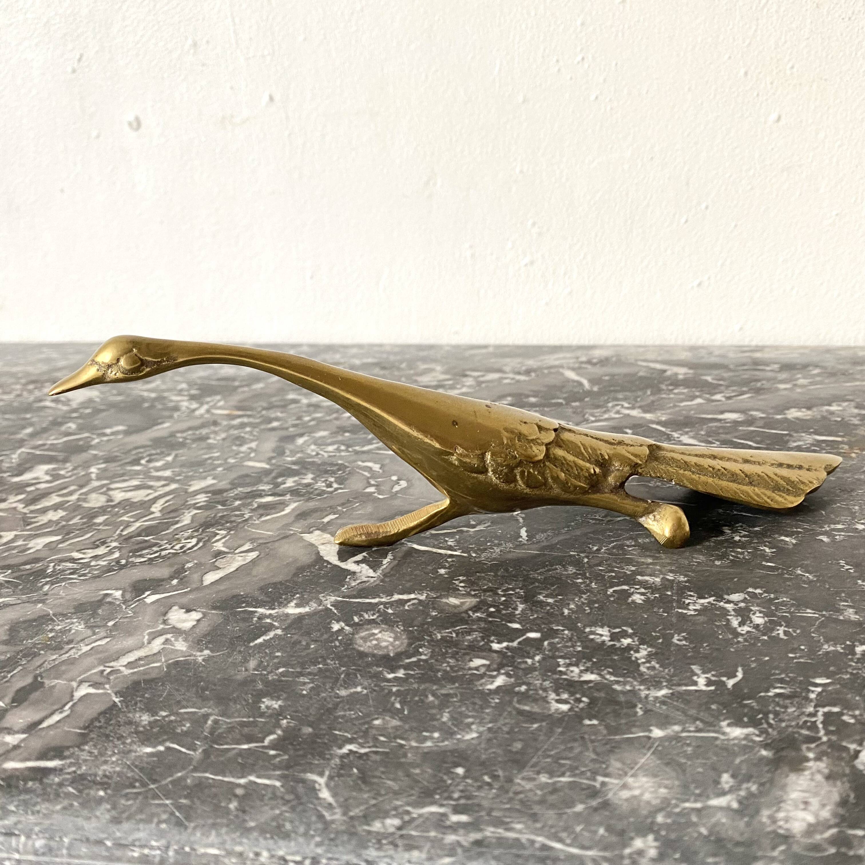 Golden brass bird