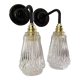Set of two electrified chiseled glass sconces to nine