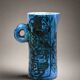 Small jug by Jacques Blin in blue ceramic with engraved animal decoration.