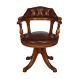 Swivel Chesterfield armchair in wood and leather