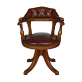 Swivel Chesterfield armchair in wood and leather