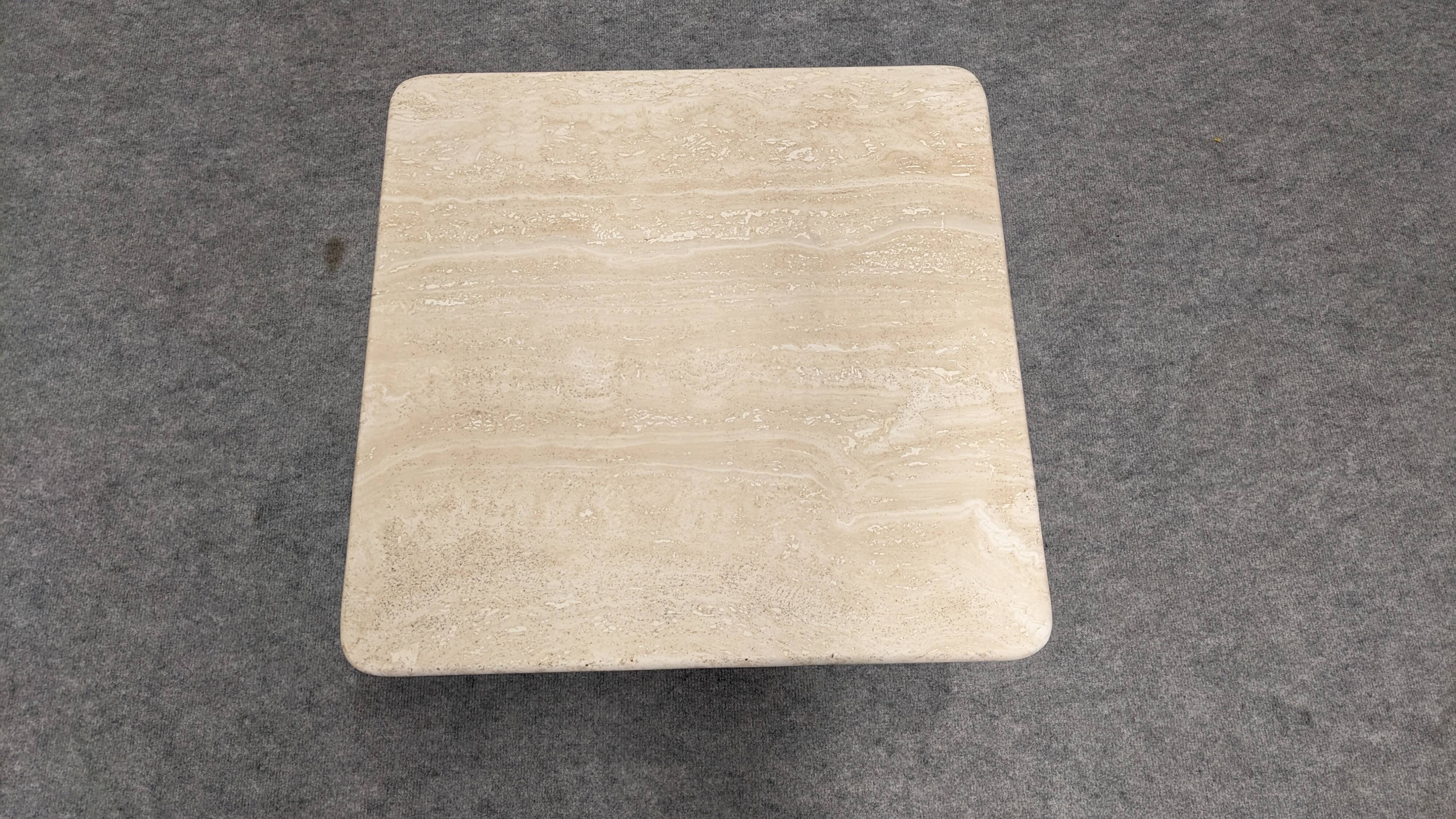 Coffee table or side table in travertine, Italy around 1970.