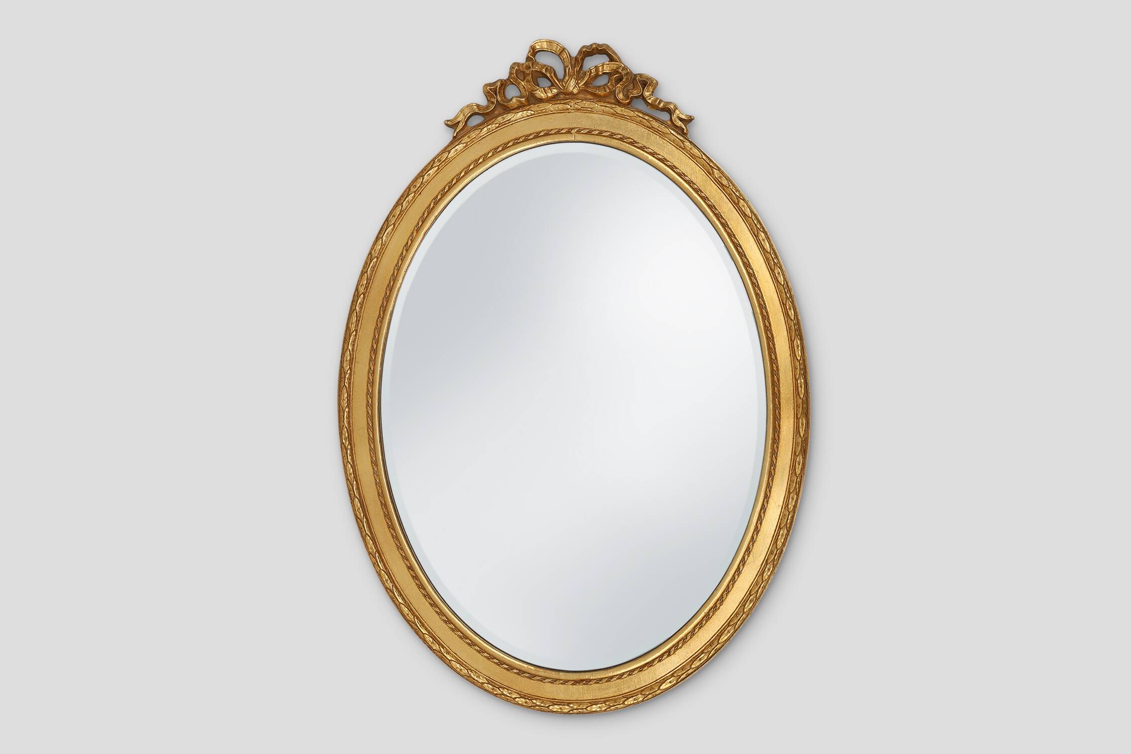 Oval shaped carved gilded Baroque mirror with beveled glass, Belgium