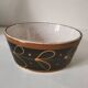 Vintage dish with black and ochre decoration and a speckled crackled interior – 1970s
