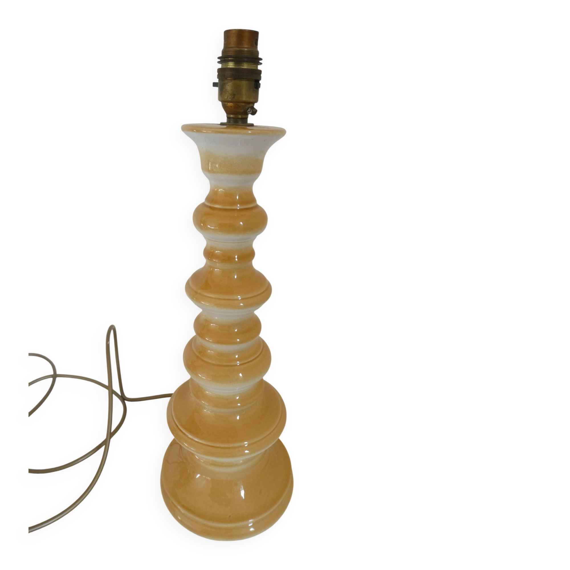 Large baluster-shaped lamp base in yellow and beige ceramic from the 1960s.