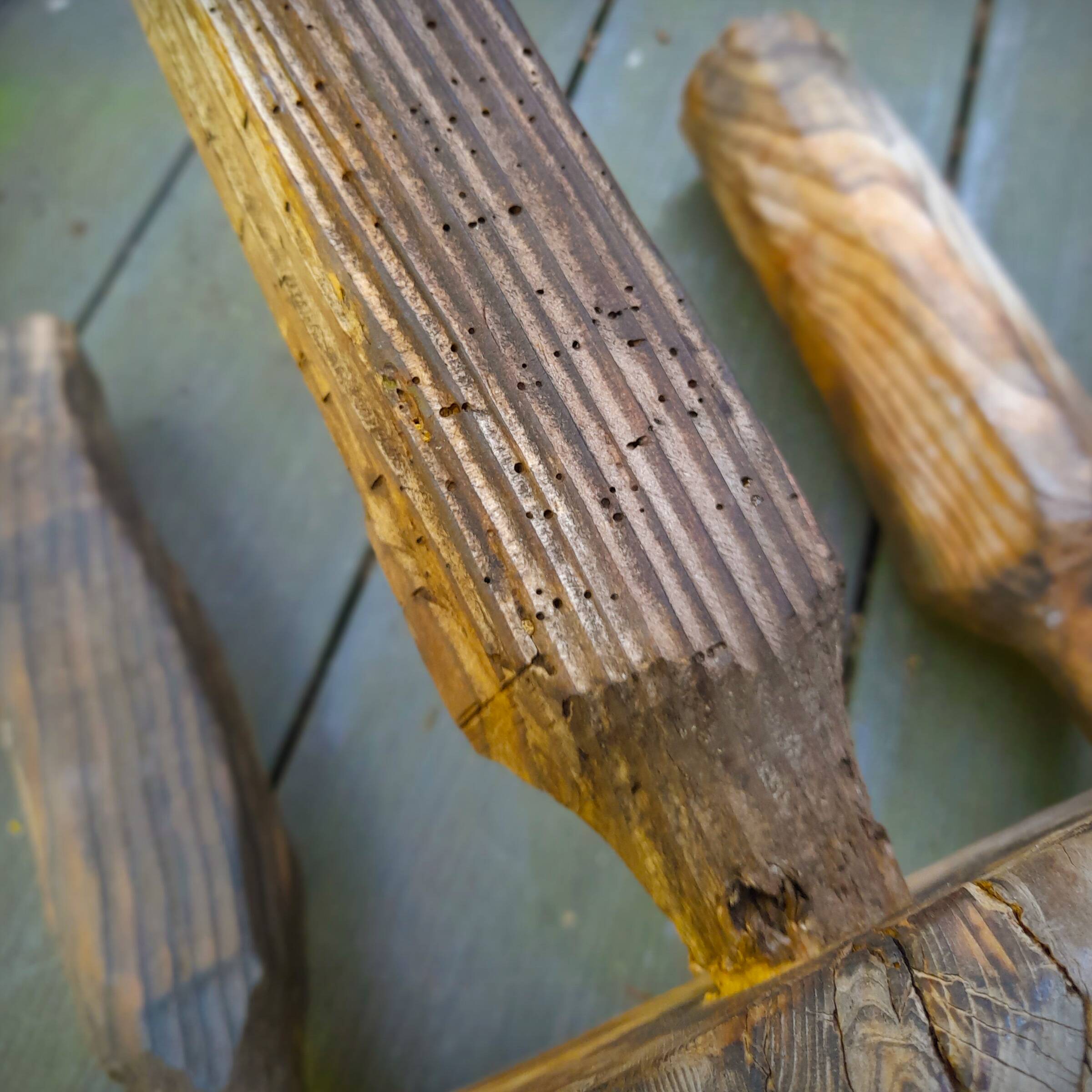 Pair of brutalist tripod stools in grayed pine. France, 1950s