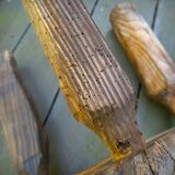 Pair of brutalist tripod stools in grayed pine. France, 1950s