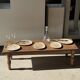 Small oval beige petrified wood dish or tray with speckled edges.