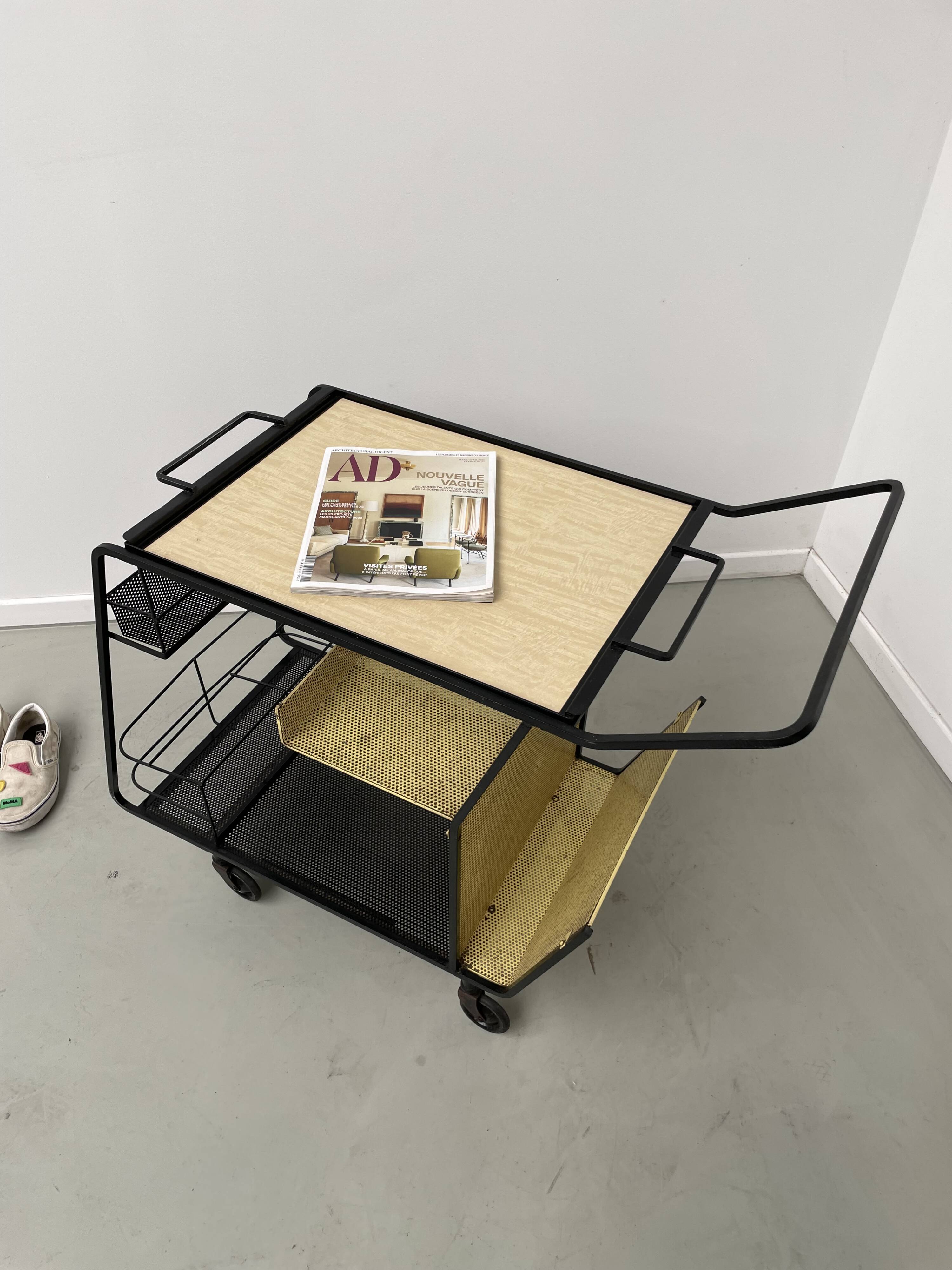 Perforated metal serving trolley in the Mathieu Matégot style