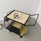 Perforated metal serving trolley in the Mathieu Matégot style