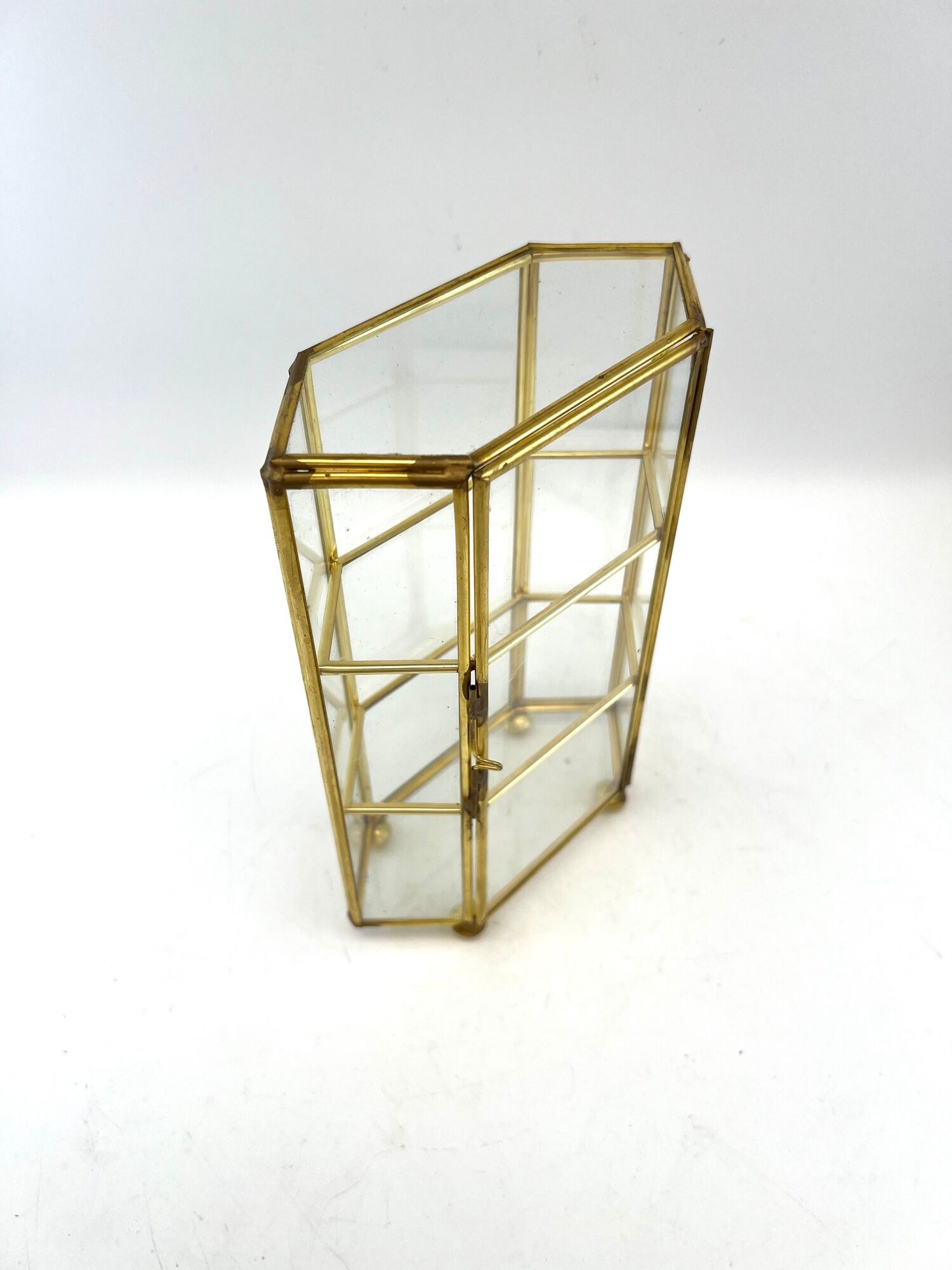Glass and brass jewelry showcase