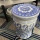 Set of two white and blue porcelain side tables.