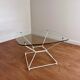 Glass coffee table with steel base