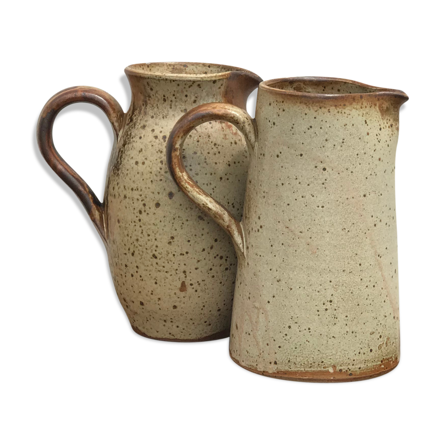 Pair of sandstone pitchers